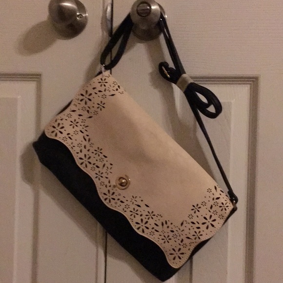 Black and cream handbag.